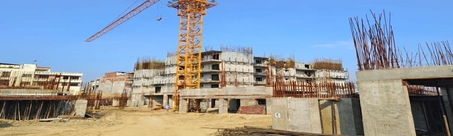 Santoshi Group construction site with tower crane